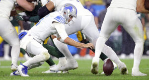 Detroit Lions quarterback Jared Goff (16) attempts to recover a fumble, which is ultimately recovered by the Green Bay Packers during the second half at Lambeau Field in Green Bay, Wis., Monday, Sept. 20, 2021.