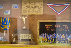 A trophy case at Riverside’s Cedar Rapids campus houses accolades from the past four years of 6-man football. This season Riverside played 8-man football with the goal of making it to the state tournament against stiffer competition.